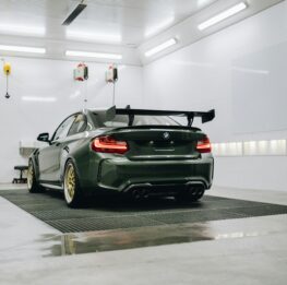 name avt lwb36wa 5076b1c5 529c 40fa 90f1 03cbfcc5f23a.jpg black porsche 911 parked in a parking lot